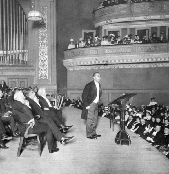 Washington giving a speech at Carnegie Hall in New York City, 1909
